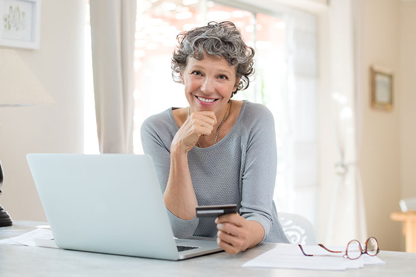 Senior woman shopping online